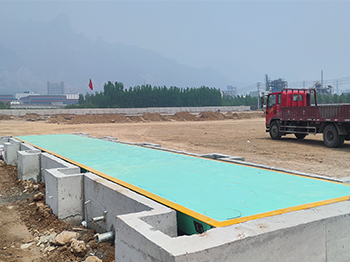 河南大岸建设：焦作沁阳工程项目100吨地磅